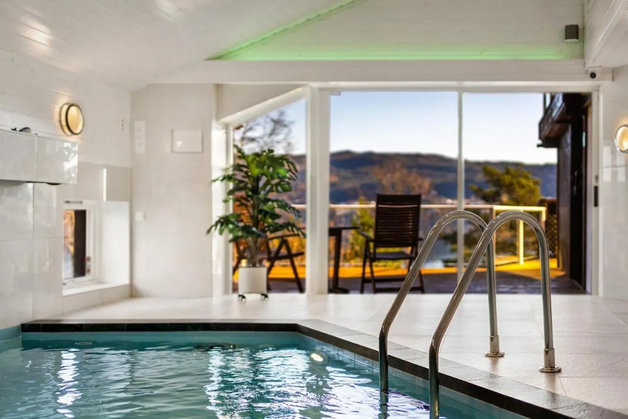 Villa Arboretet: Seaside Retreat with Private Pool & Sauna in Bergen Norway